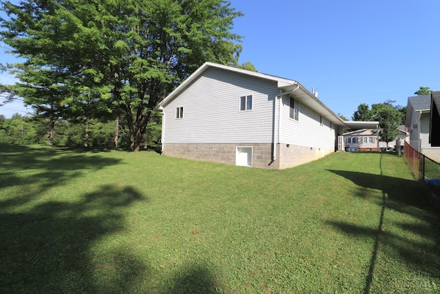 416 N Broadway St, Blanchester, OH 45107 - view of side of home with a lawn and crawl space