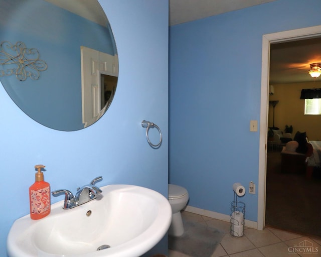 416 N Broadway St, Blanchester, OH 45107 - bathroom featuring a sink and tile patterned floors