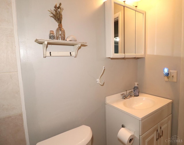 416 N Broadway St, Blanchester, OH 45107 - bathroom featuring vanity and toilet
