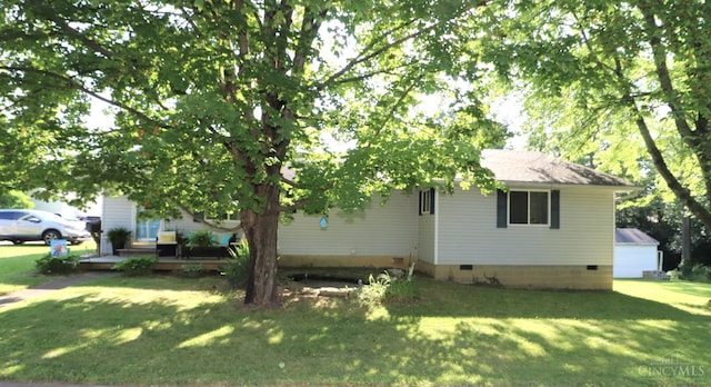 416 N Broadway St, Blanchester, OH 45107 - view of home's exterior with crawl space and a lawn