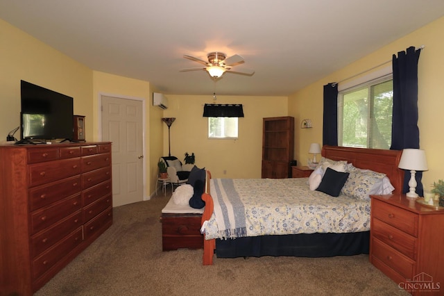 416 N Broadway St, Blanchester, OH 45107 - carpeted bedroom with ceiling fan and a wall mounted air conditioner
