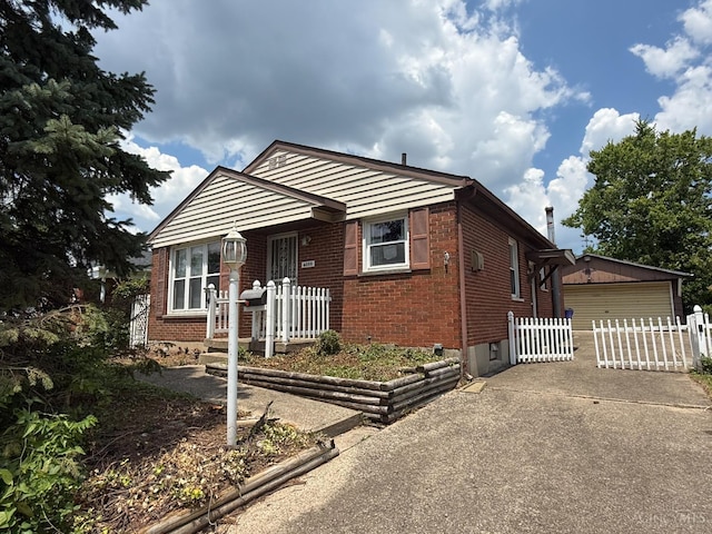 4086 Hammond Blvd, Hamilton, OH 45015 - bungalow-style home featuring brick siding and concrete driveway