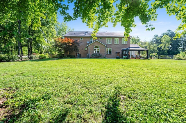 6911 Cozaddale Rd, Goshen, OH 45122 - back of property featuring a gazebo and a lawn