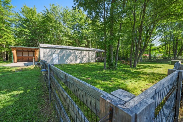 6911 Cozaddale Rd, Goshen, OH 45122 - view of yard featuring a pole building and an outbuilding