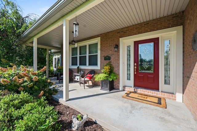 6911 Cozaddale Rd, Goshen, OH 45122 - property entrance with brick siding and covered porch