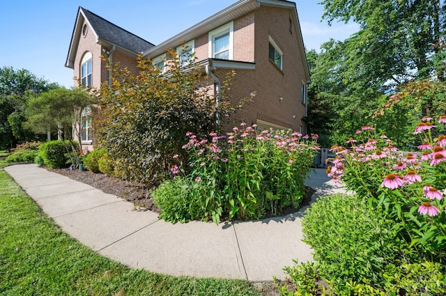 6911 Cozaddale Rd, Goshen, OH 45122 - view of home's exterior featuring brick siding