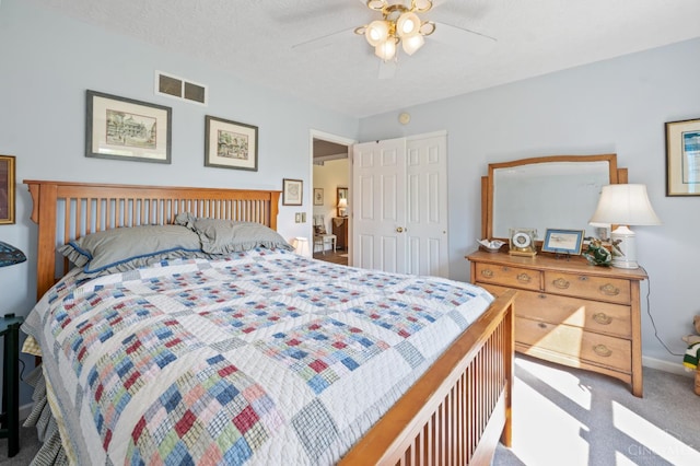 6911 Cozaddale Rd, Goshen, OH 45122 - carpeted bedroom featuring a closet and a ceiling fan