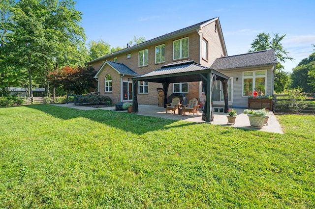 6911 Cozaddale Rd, Goshen, OH 45122 - back of house featuring a gazebo, a patio, and brick siding