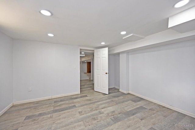 5428 Tallawanda Dr, Fairfield, OH 45014 - finished basement with wood finished floors and recessed lighting