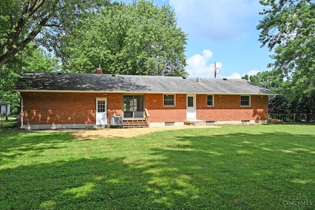 5428 Tallawanda Dr, Fairfield, OH 45014 - rear view of property featuring entry steps, a yard, brick siding, and a chimney