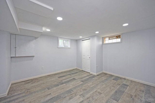 5428 Tallawanda Dr, Fairfield, OH 45014 - basement featuring recessed lighting and wood finished floors