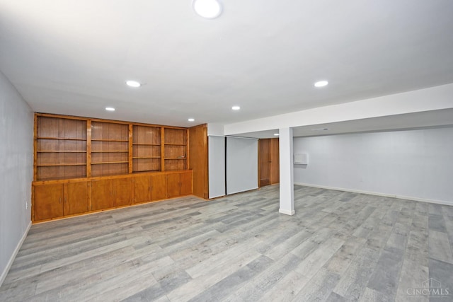 5428 Tallawanda Dr, Fairfield, OH 45014 - finished below grade area with light wood-style floors and recessed lighting