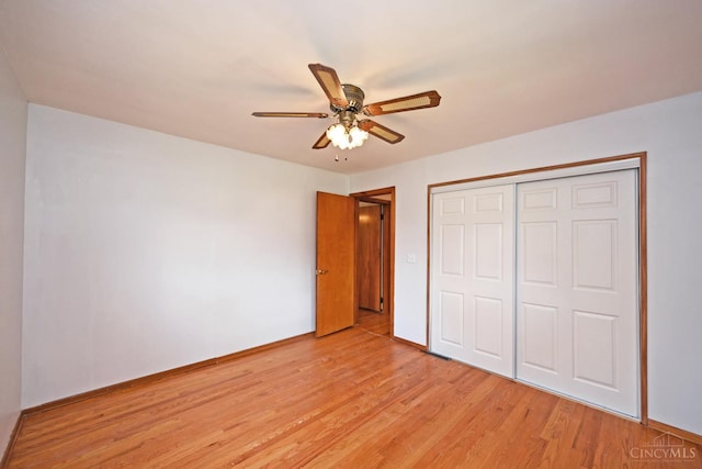 5428 Tallawanda Dr, Fairfield, OH 45014 - unfurnished bedroom with light wood-style floors, a closet, and ceiling fan