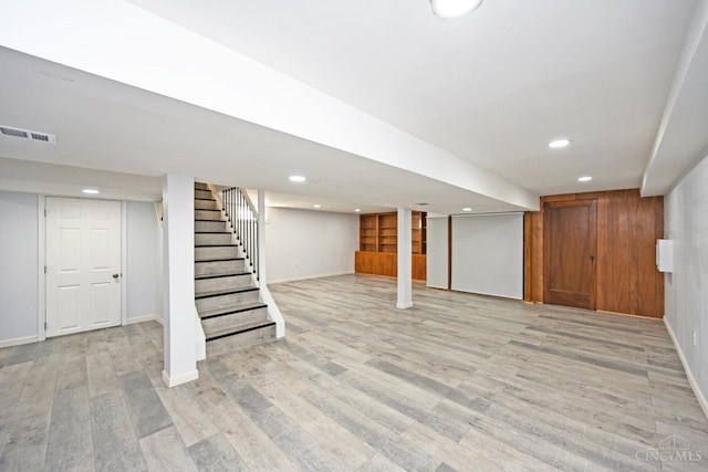 5428 Tallawanda Dr, Fairfield, OH 45014 - finished basement with light wood finished floors, stairway, and recessed lighting