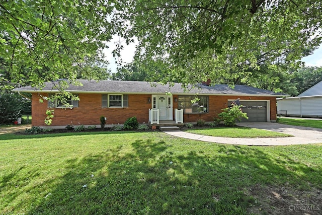 5428 Tallawanda Dr, Fairfield, OH 45014 - ranch-style home featuring brick siding, concrete driveway, a garage, and a front lawn