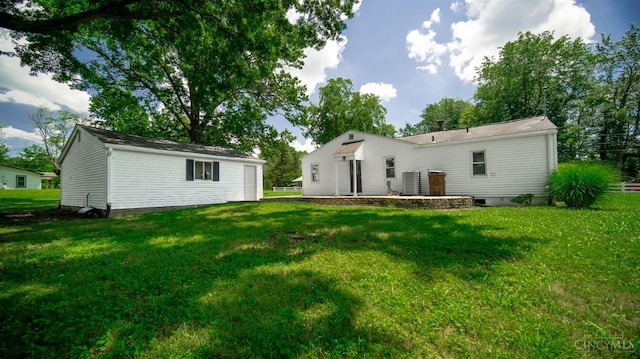 2662 Spring St, Bethel, OH 45106 - back of house with a lawn