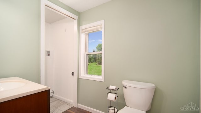 2662 Spring St, Bethel, OH 45106 - bathroom featuring vanity and wood finished floors