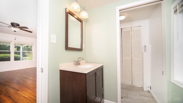 2662 Spring St, Bethel, OH 45106 - bathroom with a closet, vanity, and a ceiling fan