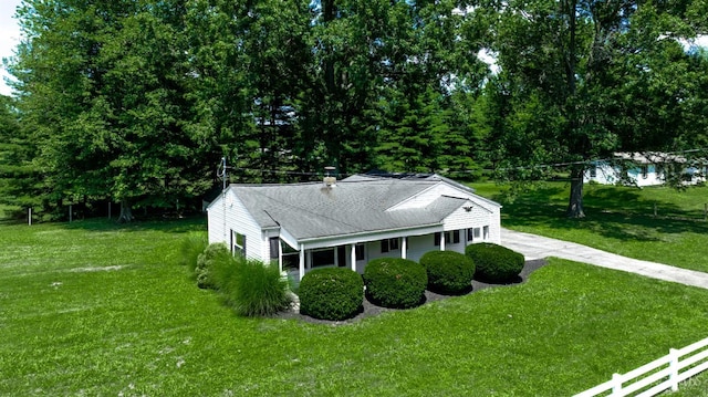 2662 Spring St, Bethel, OH 45106 - view of front of house with a front yard and roof with shingles
