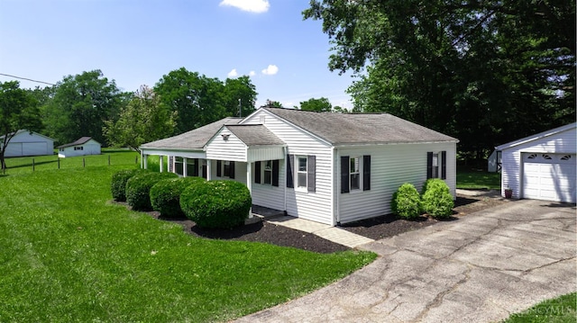 2662 Spring St, Bethel, OH 45106 - view of front of house featuring an outdoor structure and roof with shingles