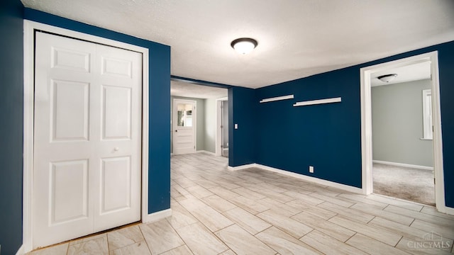 2662 Spring St, Bethel, OH 45106 - spare room featuring a textured ceiling and wood finished floors