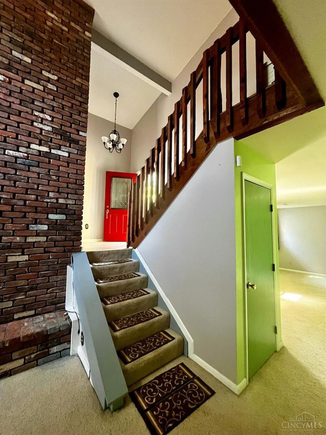 5674 Windsong Ln, Milford, OH 45150 - stairway featuring carpet floors, a chandelier, and beam ceiling