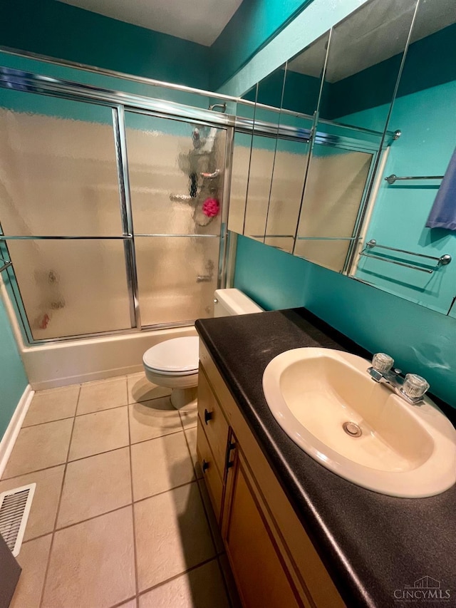 5674 Windsong Ln, Milford, OH 45150 - full bath with vanity, bath / shower combo with glass door, and tile patterned flooring