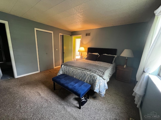 5674 Windsong Ln, Milford, OH 45150 - bedroom featuring carpet and multiple closets