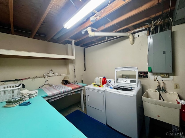 5674 Windsong Ln, Milford, OH 45150 - laundry area featuring electric panel and separate washer and dryer