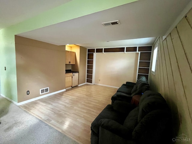 5674 Windsong Ln, Milford, OH 45150 - living room featuring light wood-style floors and built in shelves