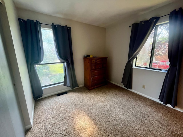 5674 Windsong Ln, Milford, OH 45150 - carpeted empty room featuring plenty of natural light