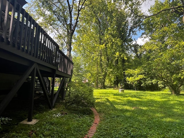 5674 Windsong Ln, Milford, OH 45150 - view of grassy yard with stairs and a deck