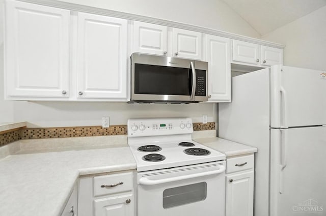 1300 Muirfield, Miami Twp, OH 45150 - kitchen with white appliances, white cabinets, light countertops, and lofted ceiling