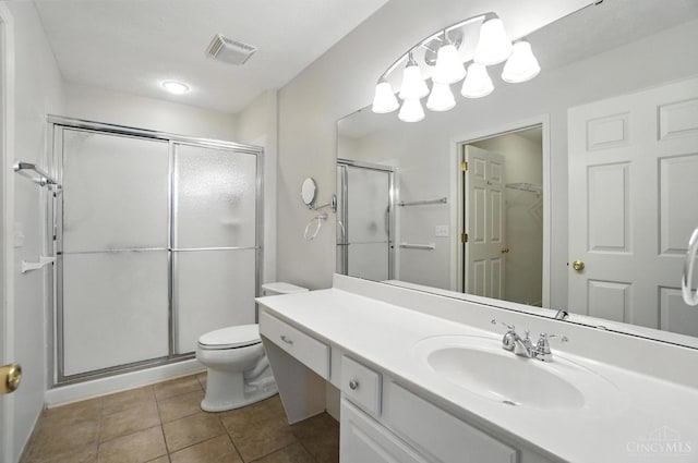 1300 Muirfield, Miami Twp, OH 45150 - bathroom featuring a shower stall, vanity, and tile patterned flooring