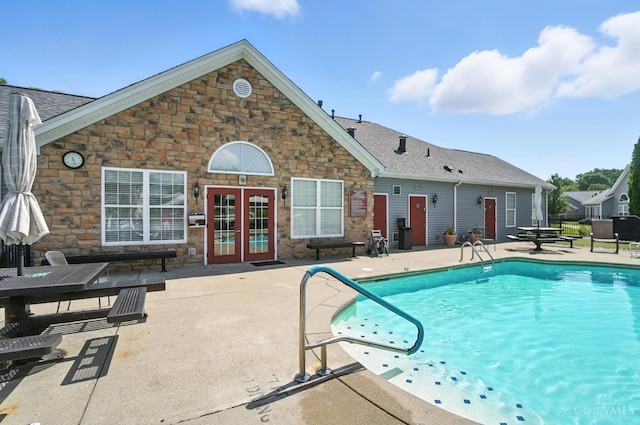 1300 Muirfield, Miami Twp, OH 45150 - community pool with a patio and french doors