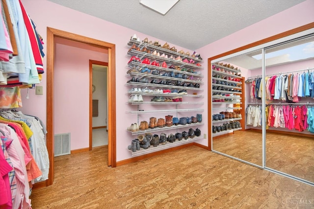 10869 Sand Run Rd, Whitewater Twp, OH 45030 - walk in closet with wood finished floors