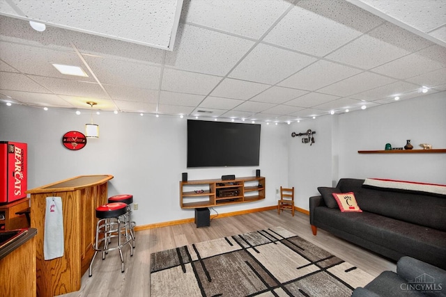 10869 Sand Run Rd, Whitewater Twp, OH 45030 - living room with a drop ceiling and wood finished floors