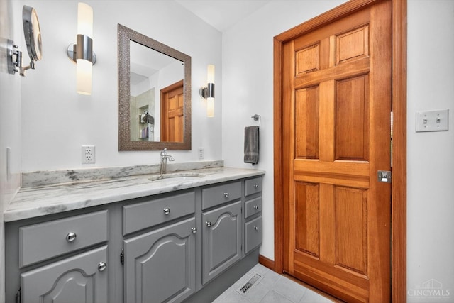 10869 Sand Run Rd, Whitewater Twp, OH 45030 - bathroom featuring vanity and tile patterned flooring