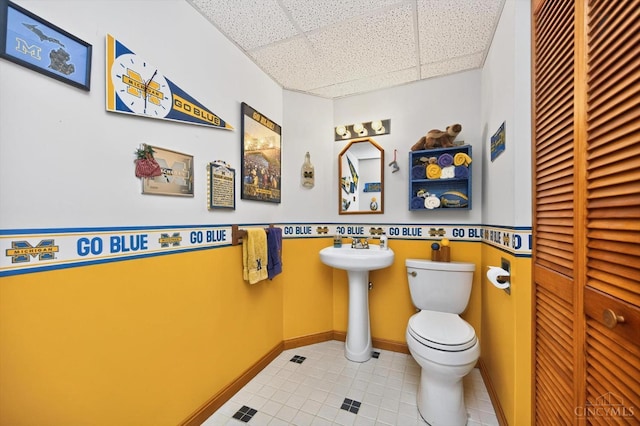 10869 Sand Run Rd, Whitewater Twp, OH 45030 - bathroom with a paneled ceiling, tile patterned flooring, and a closet