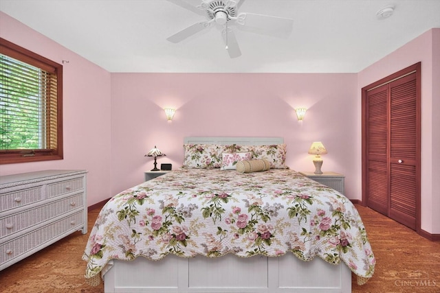10869 Sand Run Rd, Whitewater Twp, OH 45030 - bedroom featuring wood finished floors, a closet, and ceiling fan