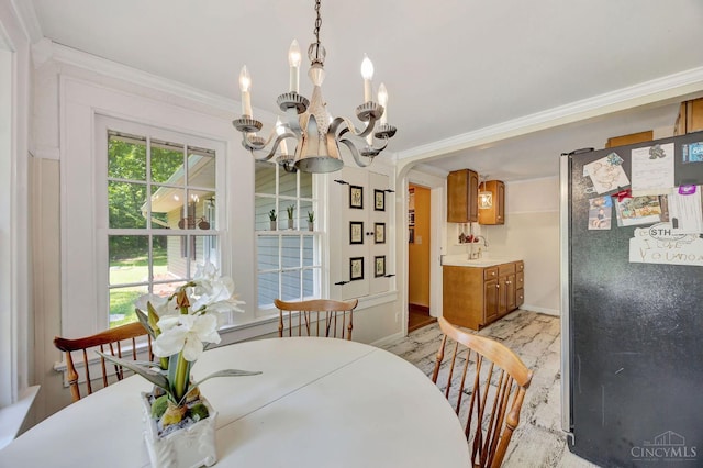 799 Millville Oxford Rd, Hamilton, OH 45013 - dining area featuring a chandelier, crown molding, and arched walkways