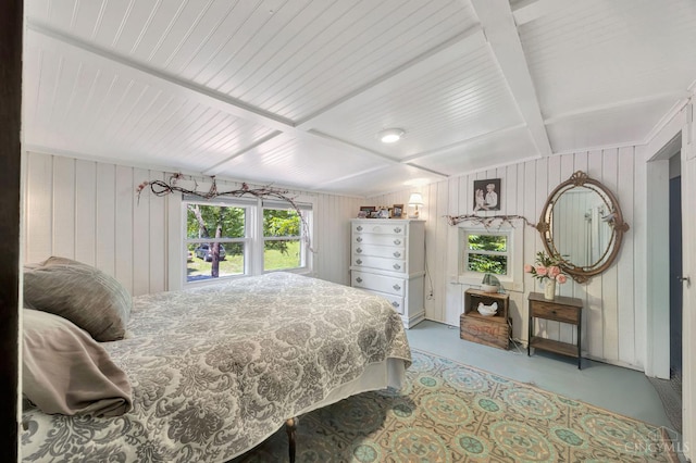 799 Millville Oxford Rd, Hamilton, OH 45013 - bedroom featuring finished concrete flooring, wooden walls, and beam ceiling
