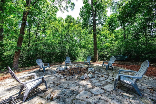 799 Millville Oxford Rd, Hamilton, OH 45013 - view of patio / terrace with an outdoor fire pit and a view of trees