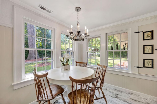 799 Millville Oxford Rd, Hamilton, OH 45013 - dining area with a chandelier, crown molding, plenty of natural light, wood finished floors, and wainscoting