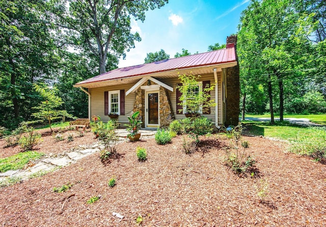 799 Millville Oxford Rd, Hamilton, OH 45013 - view of front of home with a porch, a chimney, and a metal roof