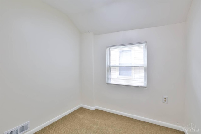 841 Willow Ave, Hamilton, OH 45013 - unfurnished room featuring light carpet and lofted ceiling