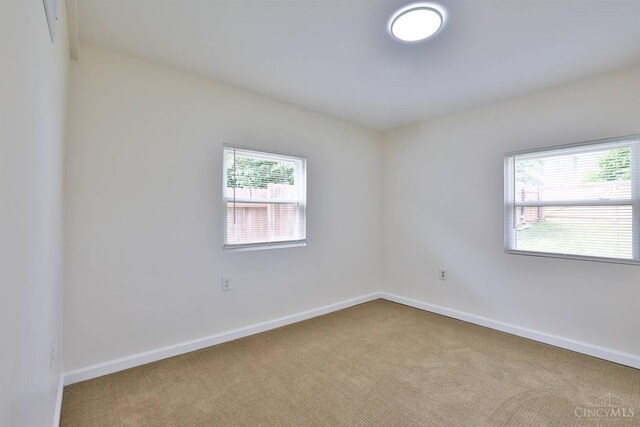 841 Willow Ave, Hamilton, OH 45013 - carpeted spare room featuring baseboards
