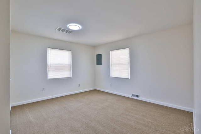 841 Willow Ave, Hamilton, OH 45013 - carpeted spare room featuring baseboards and electric panel