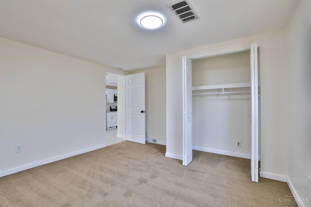 841 Willow Ave, Hamilton, OH 45013 - unfurnished bedroom featuring light colored carpet and a closet
