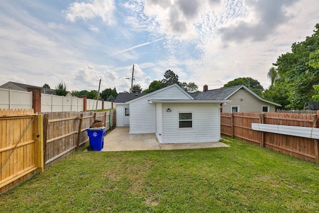 841 Willow Ave, Hamilton, OH 45013 - back of property featuring a patio area and a fenced backyard